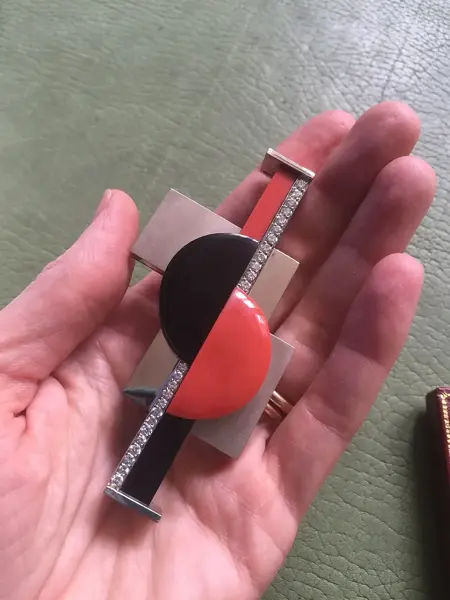 Art Deco platinum and diamond geometric brooch with calibré-cut sapphires